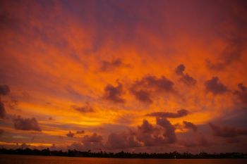 Sunrise at anchor just south of Daytona Beach, Florida...smell the java? Frittatas in Muffin Tins