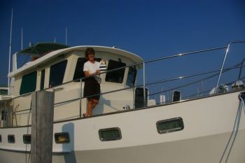Proud owner with her Kadey Krogen 48...after docking and debriefing on a different trip. This time we were in Cape May, New Jersey. Kadey-Krogen 48 Trawler Training in the St Lucie River, Stuart FL