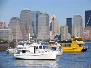 Another boater admired this terrific Kadey-Krogen 39, snapping a few photos as we navigated the very busy New York City Harbor. Note the bright yellow water taxi among all the other pleasure craft. Kadey-Krogen 39 Bethany, DE to Long Island, NY