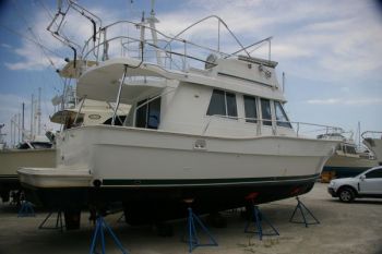 Stripped of all canvas, she is ready for the summer storage season. Mainship for Summer Storage