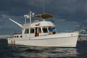 The dinghy is launched! The new owners of this GB46 have learned so much from Captain Chris...enough to continue their adventure SOLO! Trawler Training at the Helm of a Grand Banks 46