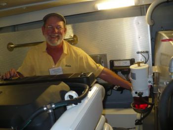 Captain Chris in the engine room. He will take the mystery out of fuel filtration. Maintenance by YOU! The Boat Owner