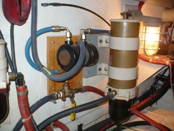 This traditional RACOR diesel fuel filter and water separator. Note the T-handle on the top which is standard. The vacuum gauge in the video is an option we highly recommend. Dirty Fuel Filter