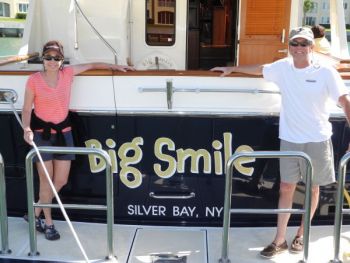 After backing in this BIG single engine boat, BIG SMILES all around ready to meet their new dock neighbors! Docking Tips with Captain Chris